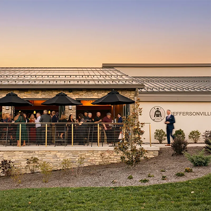 Guests gathered on the terrace at Jeffersonville Golf Club at sunset